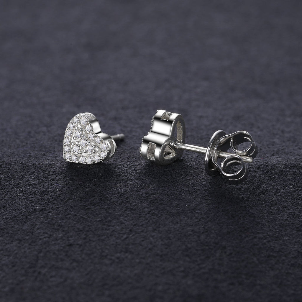 Heart studs worn
