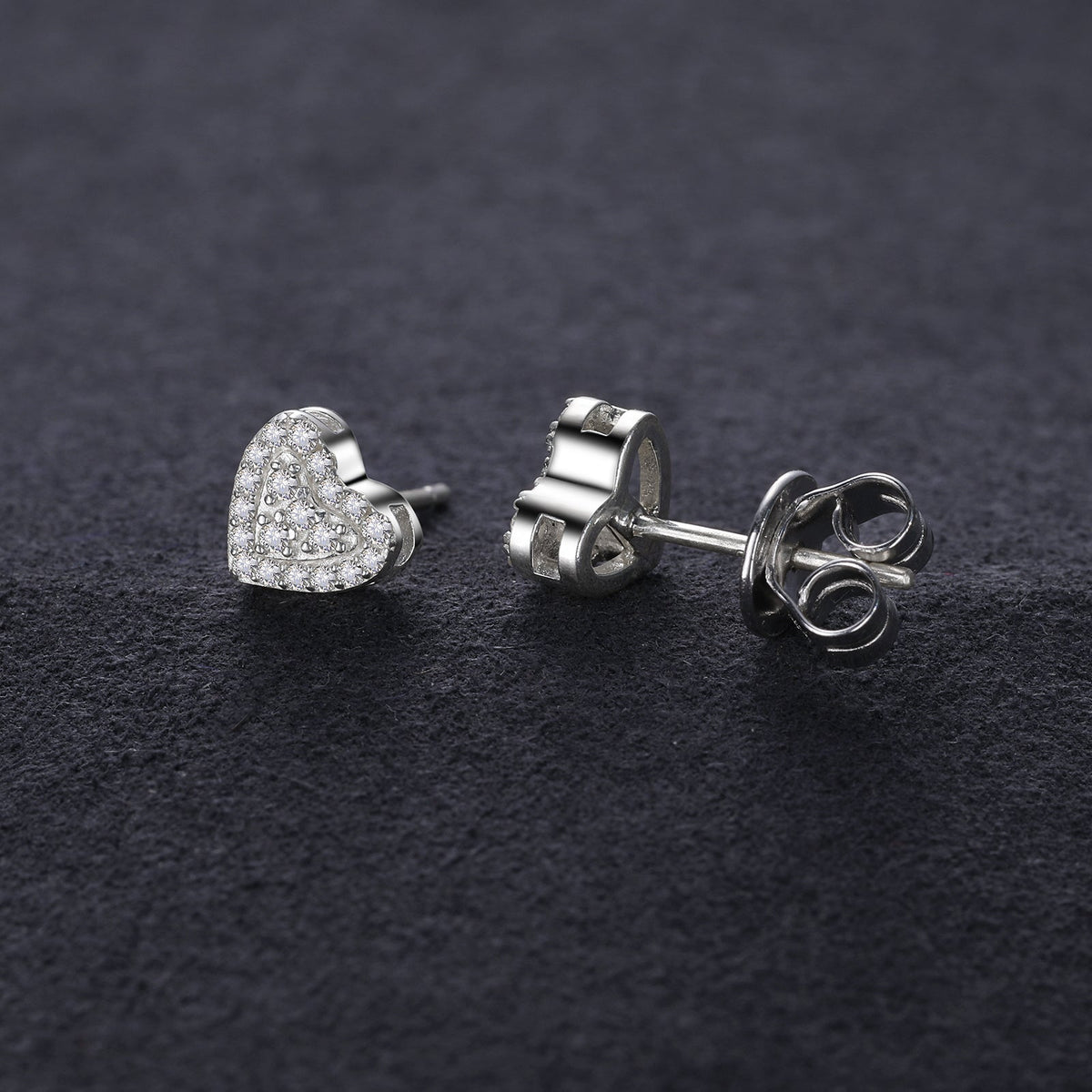 Heart studs worn